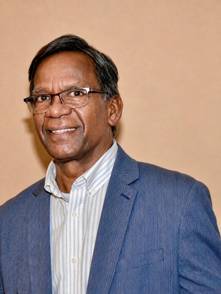Mr. E. Thevarajah